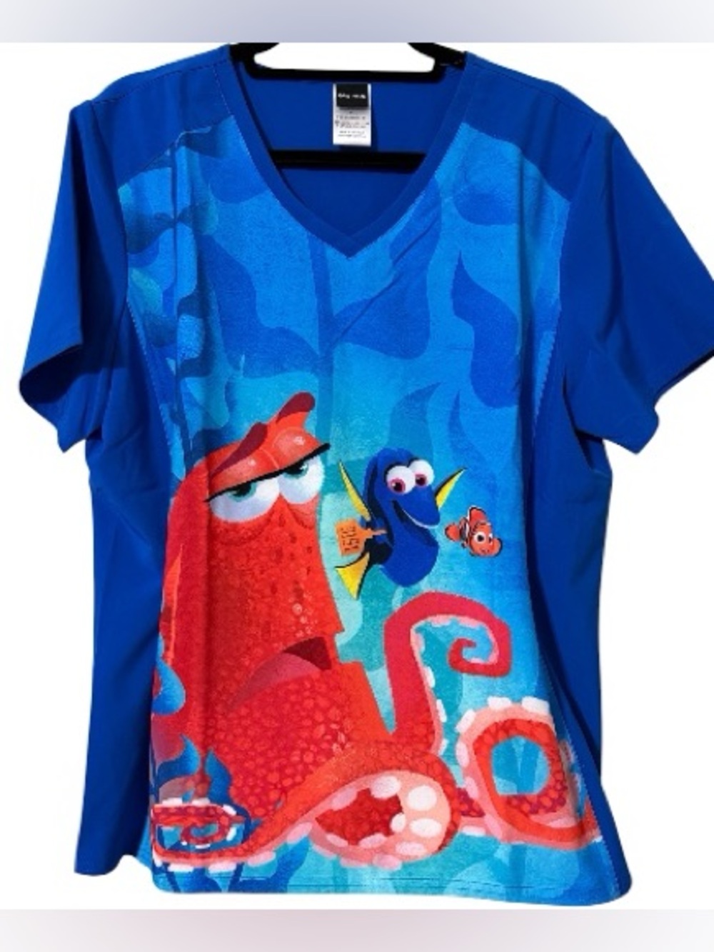 Disney Pixar women’s size large pullover v-neck scrub top Nemo Dori children